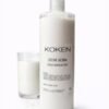 Leche ácida post depilación Koken 500ml en botella transparente con dosificador sobre fondo blanco — restaura el pH de la piel tras la depilación con cera