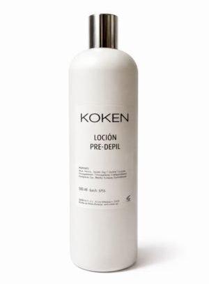 Loción pre-depil Koken 500ml en botella blanca con tapón plateado sobre fondo blanco — prepara la piel antes de la depilación y previene la foliculitis